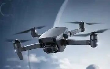 Small military drone in flight, representing the high-power Glass Anode™ cells developed under the AFWERX SBIR Phase I contract