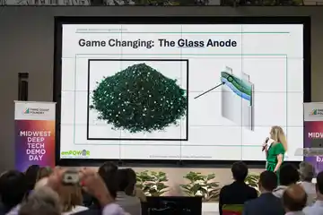 Empower Battery Technology presenting the Glass Anode at Midwest Deep Tech Demo Day, with Third Coast Foundry signage on stage